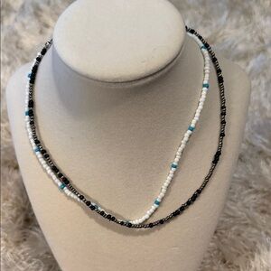 Elegant Beaded Necklace - Black, White, and Blue